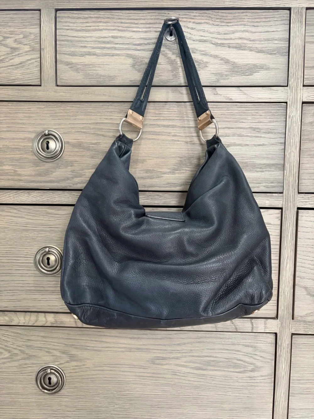 Foley & Corinna Black Leather Shoulder Bag with Modern Gold Accents